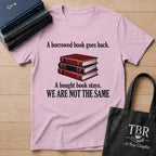 A Borrowed Book Goes Back A Bought Book Stays T-Shirt