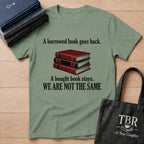 A Borrowed Book Goes Back A Bought Book Stays T-Shirt