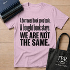 A Borrowed Book Goes Back A Bought Book Stays T-Shirt