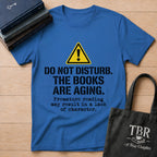Do Not Disturb The Books Are Aging T-Shirt